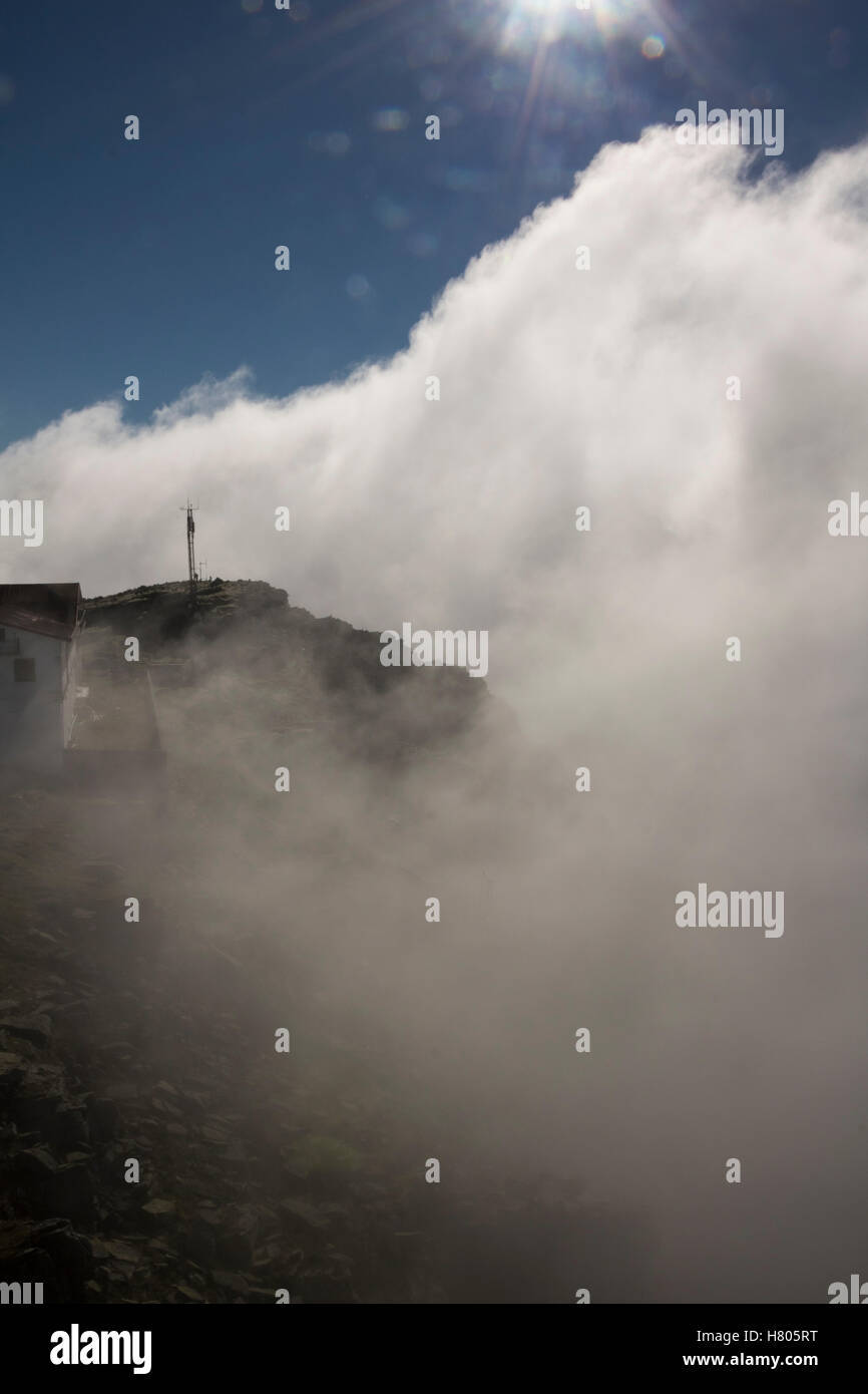 The summit of La Rhune, breaking through cloud Stock Photo