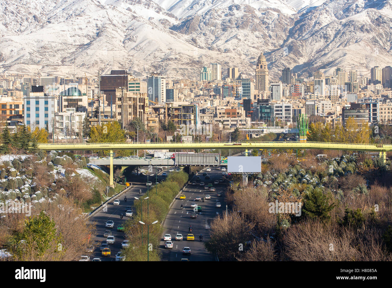 Winter Tehran view with a snow covered Alborz Mountains on background. Panorama Stock Photo