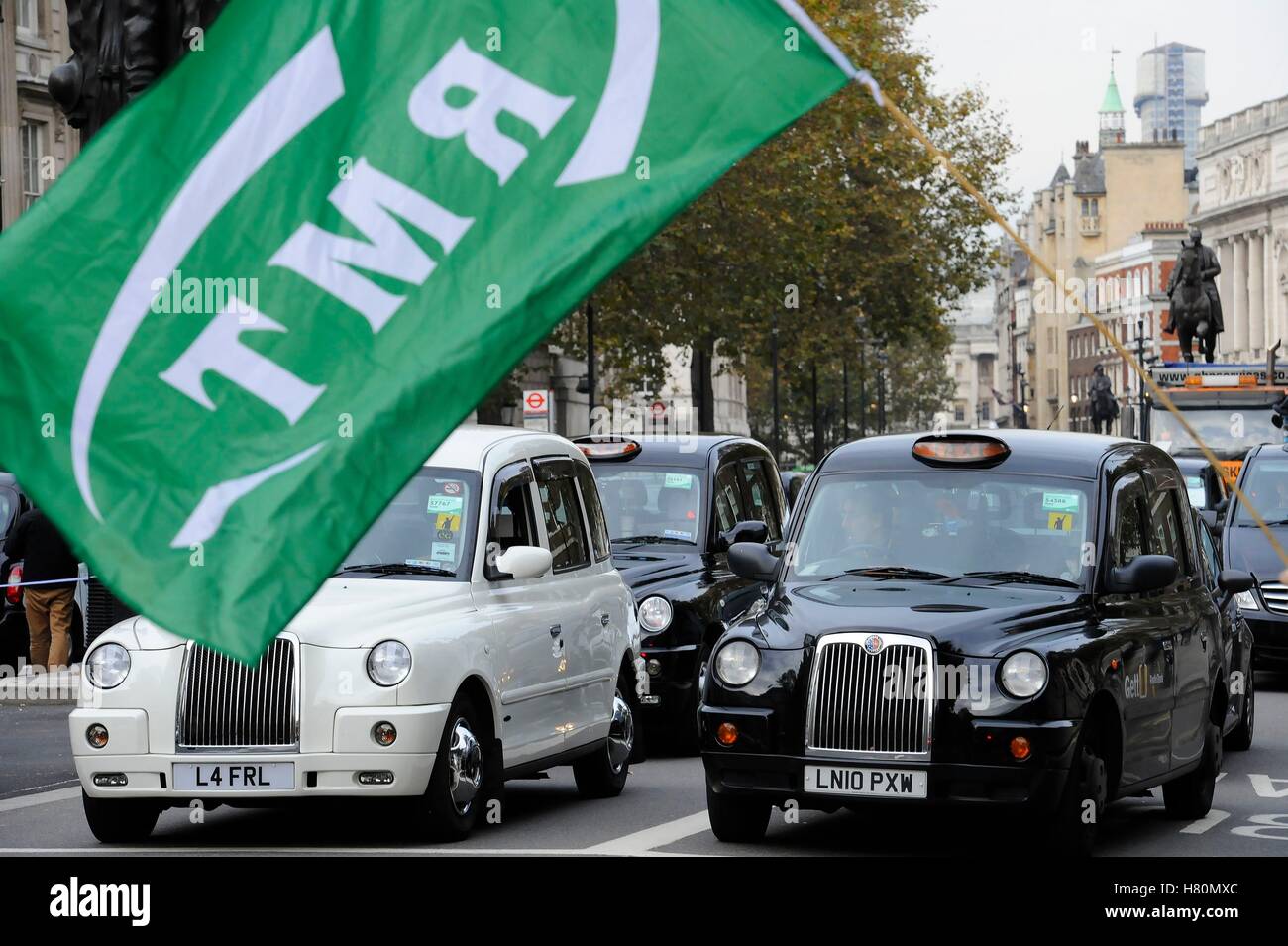 Black cab drivers hold a protest in Whitehall, London, to call for an inquiry into Transport for London (TfL) over congestion and air pollution. Stock Photo