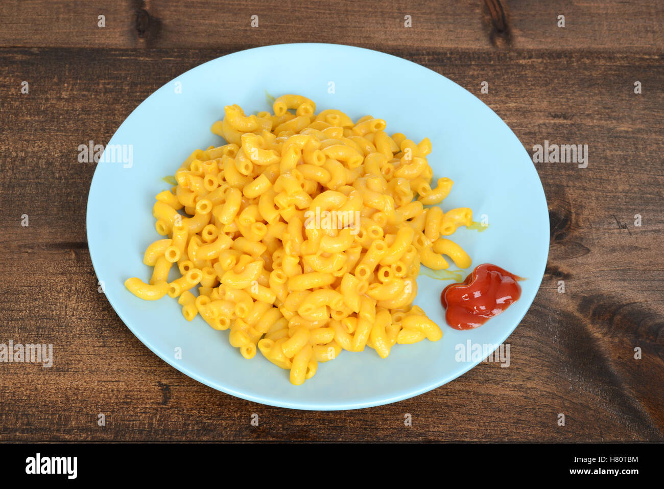 top view macaroni and cheese with blue plate Stock Photo