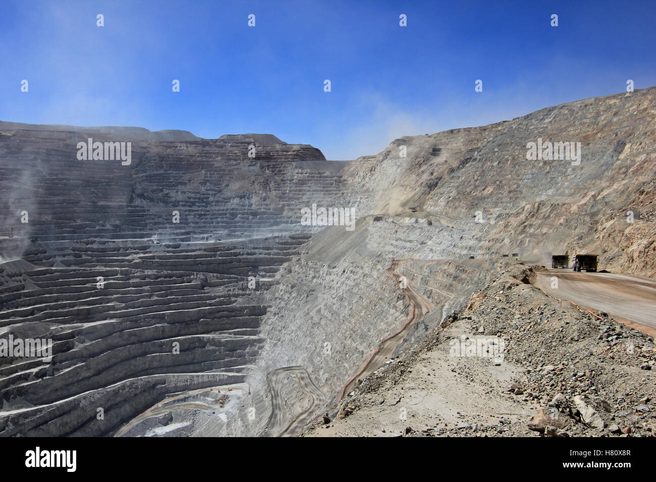 Chuquicamata, the world's biggest open pit copper mine with its trucks working, near Calama, Chile Stock Photo
