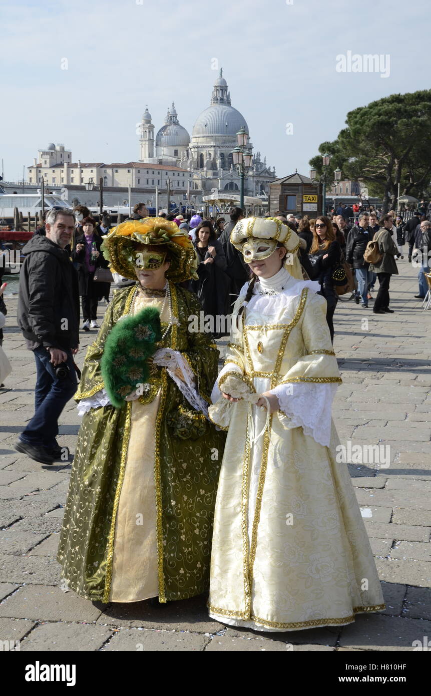 Two women in costume at the Venice Carnival Stock Photo - Alamy