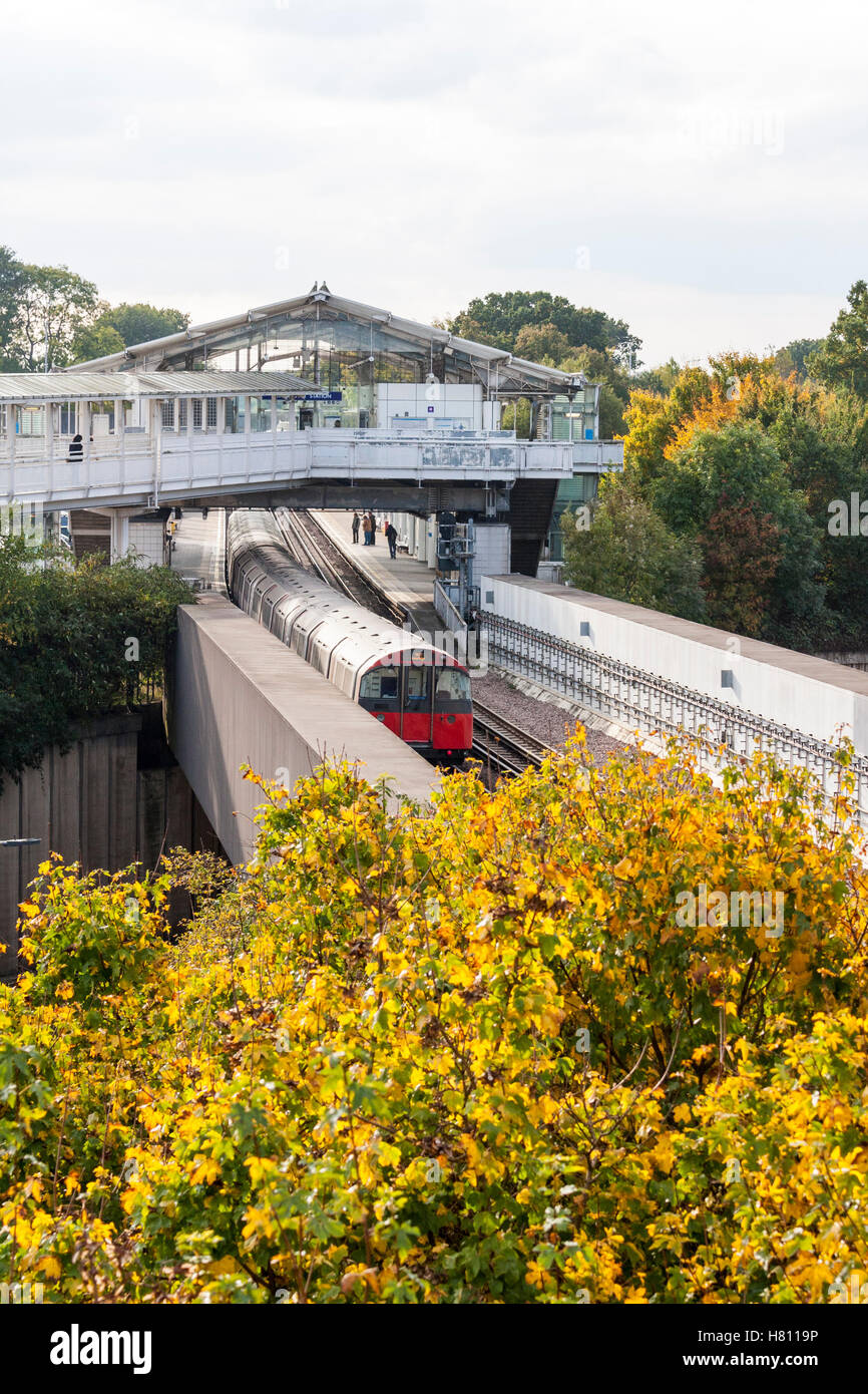A Piccadilly line train pulling into Hillingdon Undergroud Station, Greater London, UK Stock Photo