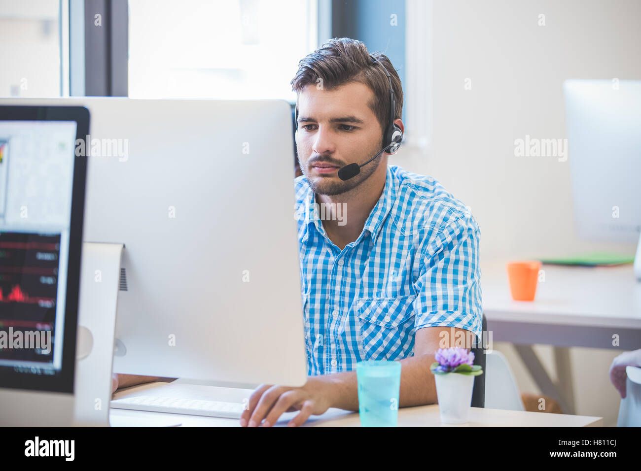 startup business, software developer working on desktop computer Stock ...