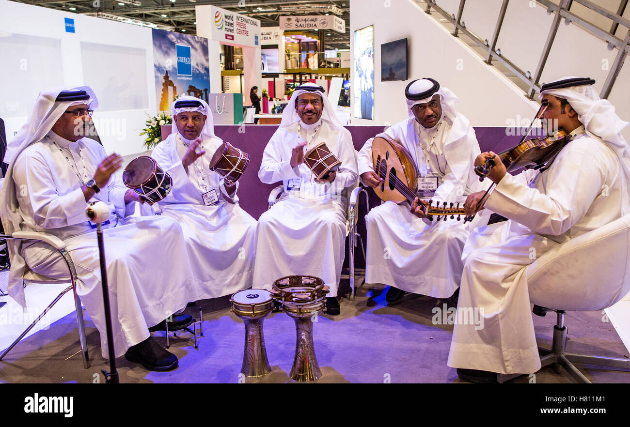 Qatar Arabs Playing Music at The World Travel Market London UK Stock Photo