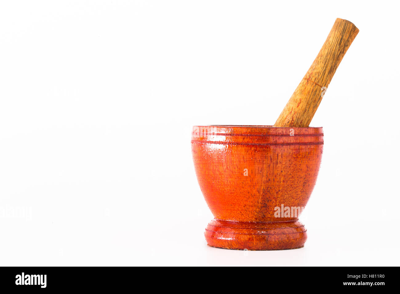 Mortar and pestle on a white background Stock Photo Alamy