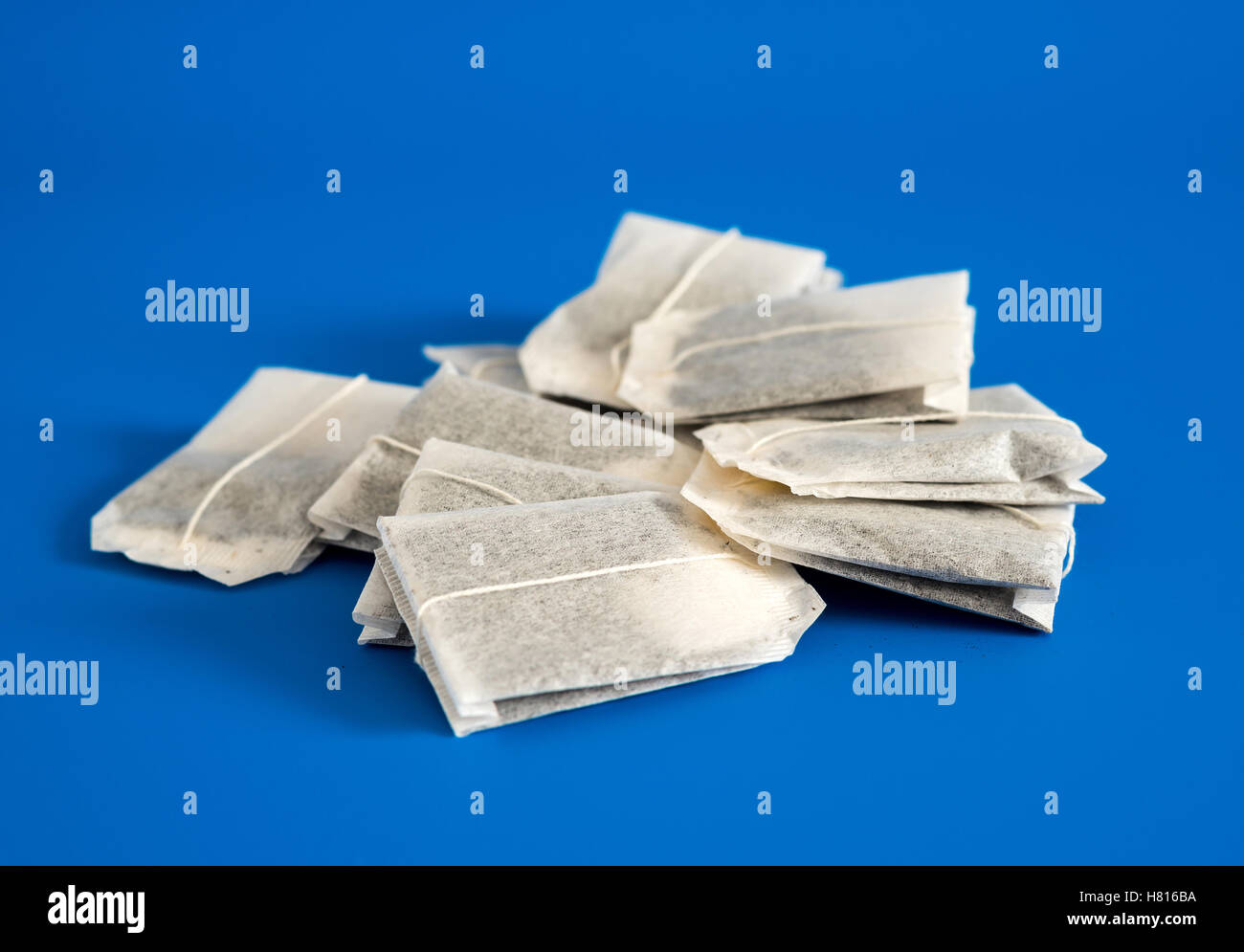 Tea in bags on blue background Stock Photo