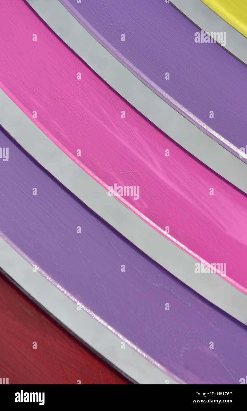 Close up of a multi-colored sections of a garden bench Stock Photo