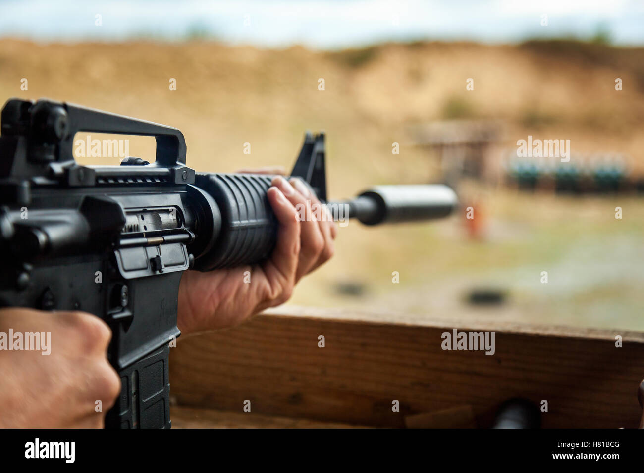 shooting, shooting on the street, ground, guns, shooting, shells on the ground, bullets on the table, shot, shots on target, tar Stock Photo