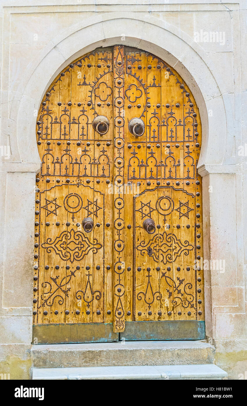 The traditional arabic door, decorated with islamic patterns, made of