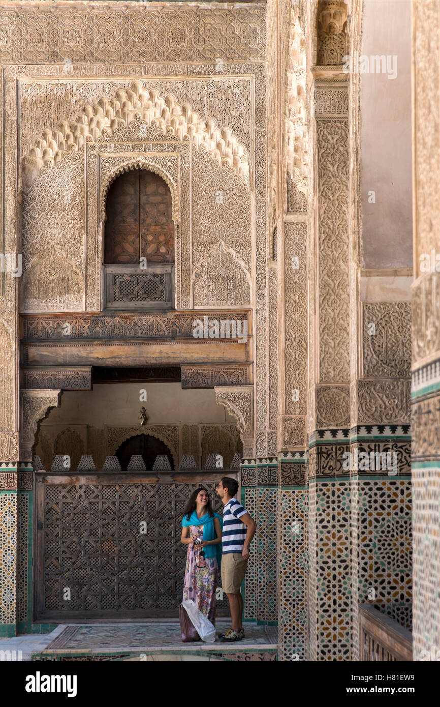 Morocco,Fez,Bou Inania Medersa, built between 1350 and 1355, young couple admiring architecture Stock Photo