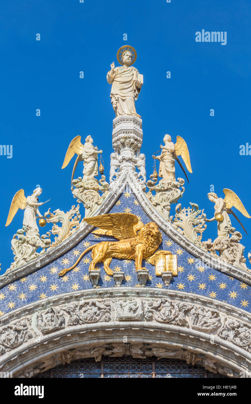 Venice, Venice Province, Veneto Region, Italy.    Statue of St. Mark, the patron of Venice, surrounded by angels. Stock Photo