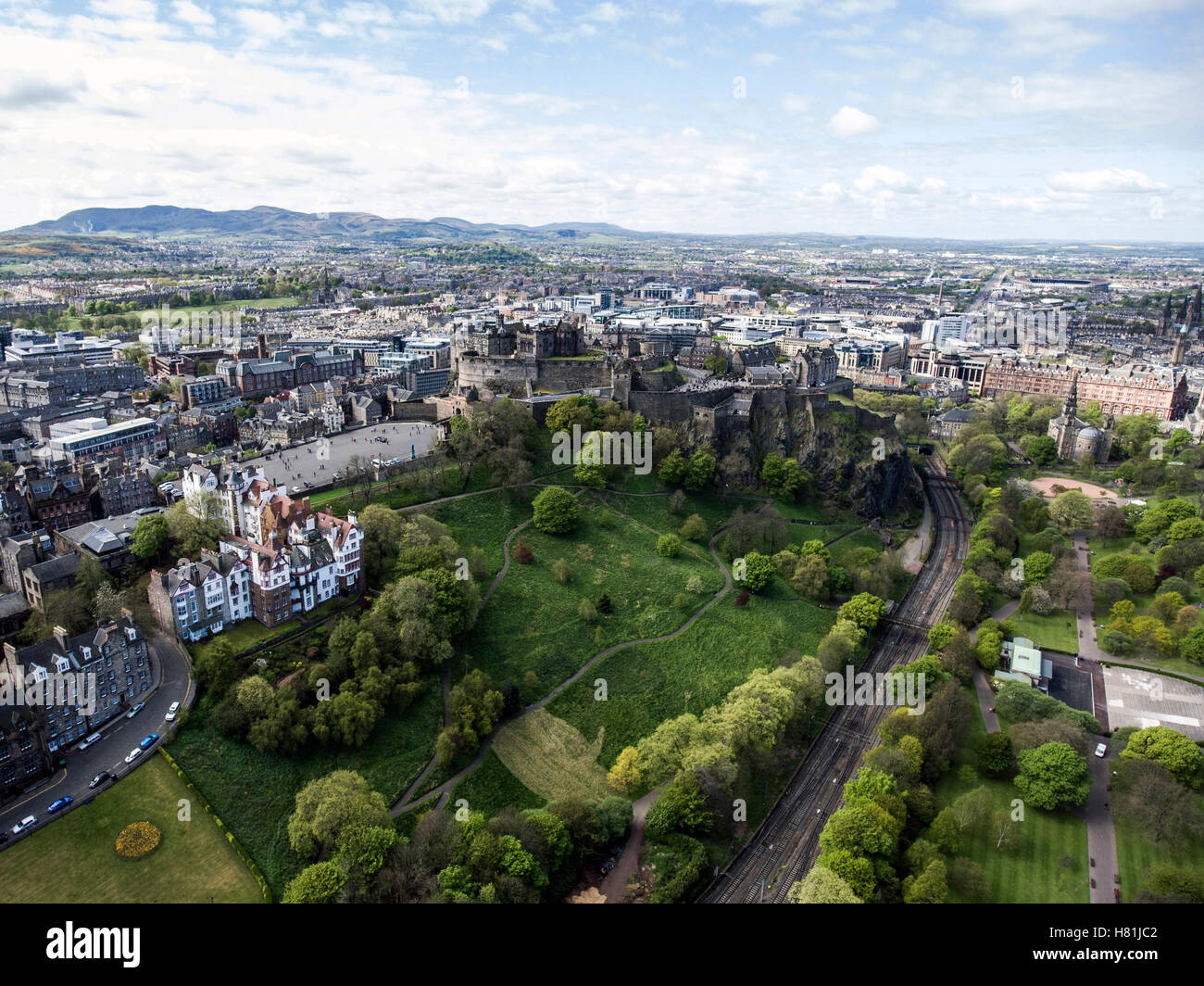 Edinburgh city the historic Castle Rock sunny Day Aerial shot 4 Stock Photo
