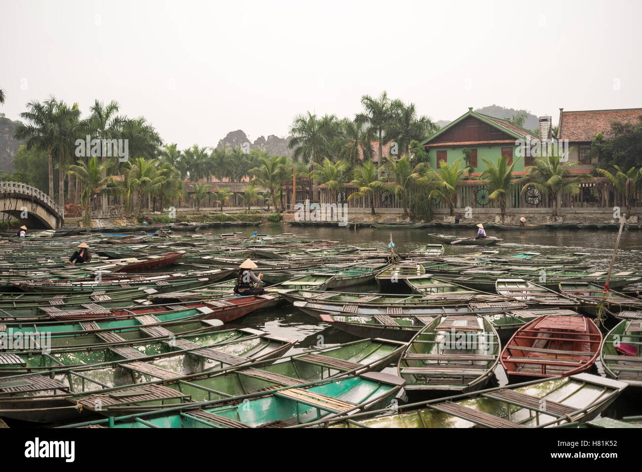 Boats in Tam Coc wharf, Ninh Binh province, Vietnam. Stock Photo