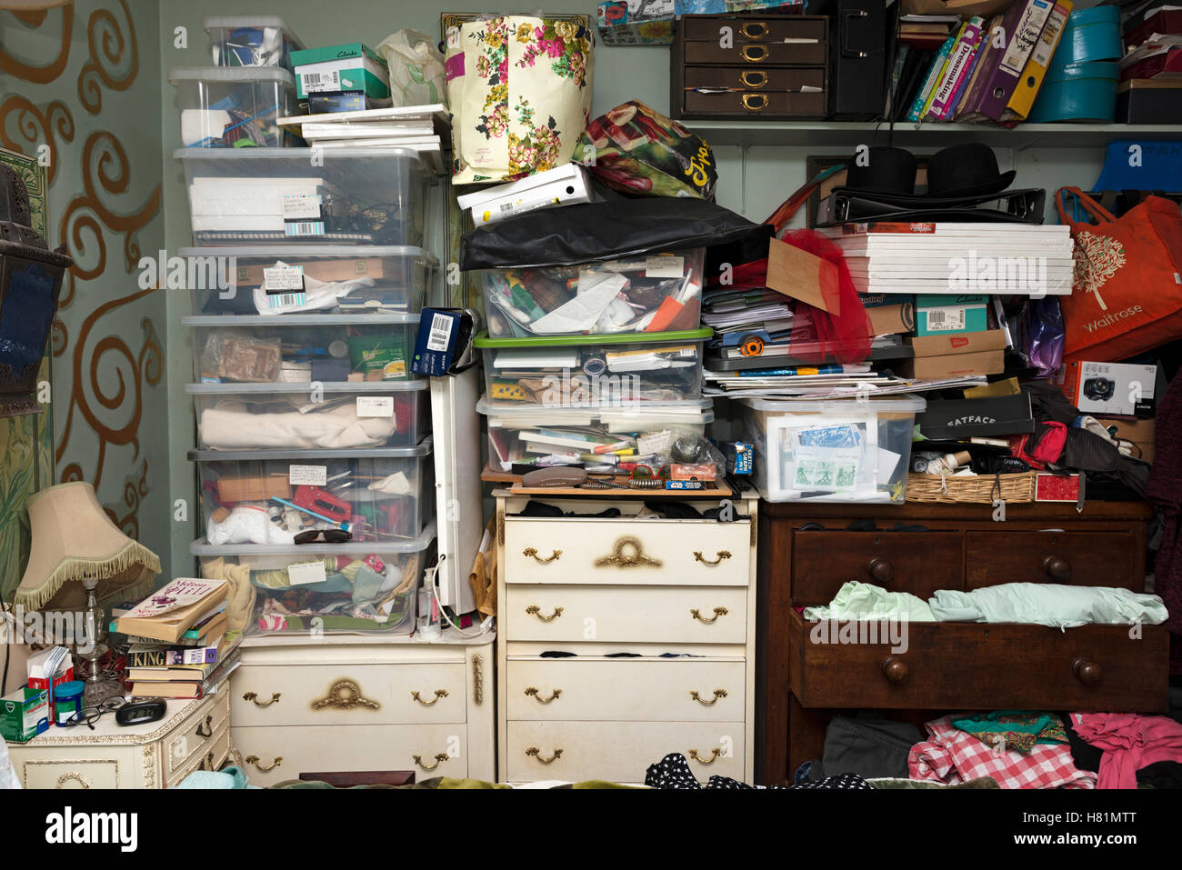 Clutter in ladies bedroom Stock Photo
