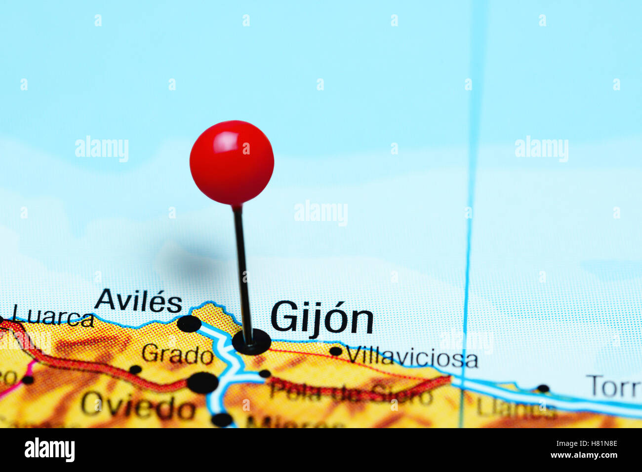 Gijon pinned on a map of Spain Stock Photo