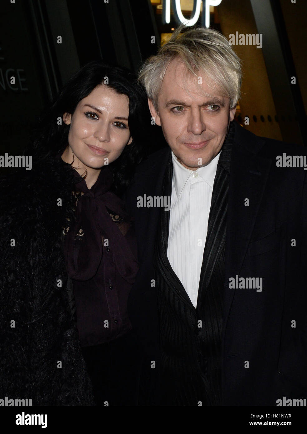 Nick Rhodes and Nefer Suvio arrive at the opening of The Radical Eye: Modernist Photography from the Sir Elton John Collection exhibition at the Tate Modern in London. Stock Photo