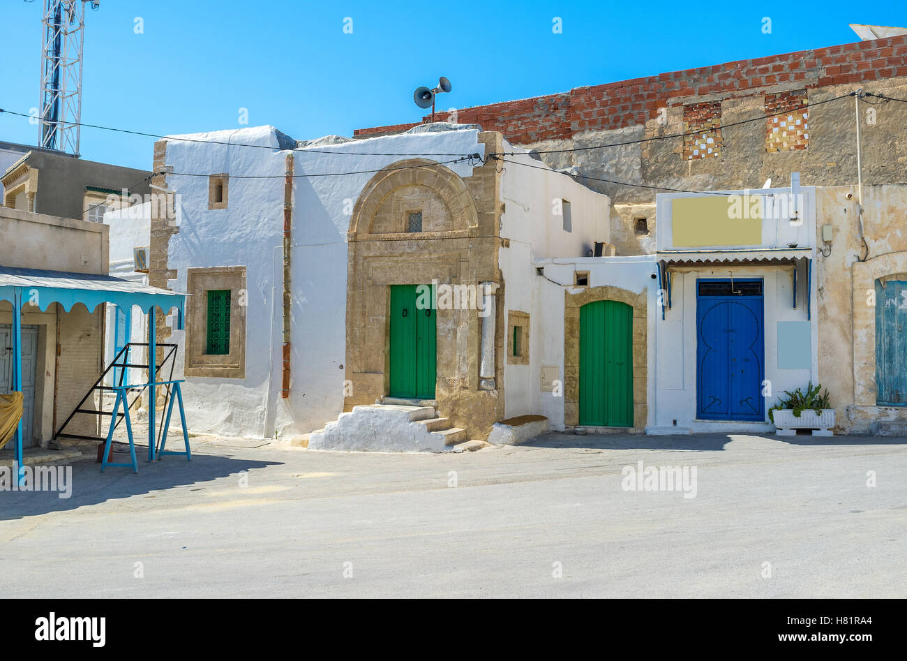 The tine square of the old town with many colorful wooden doors, Mahdia, Tunisia. Stock Photo
