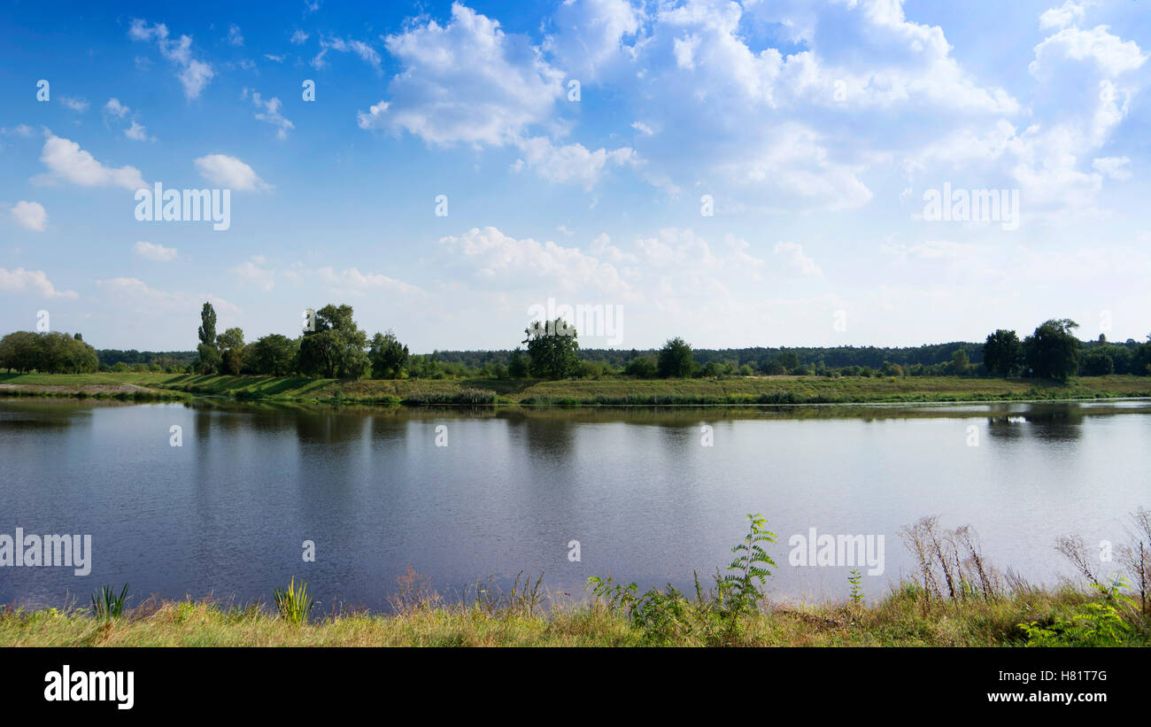 Idyllic riverbank landscape Stock Photo Alamy