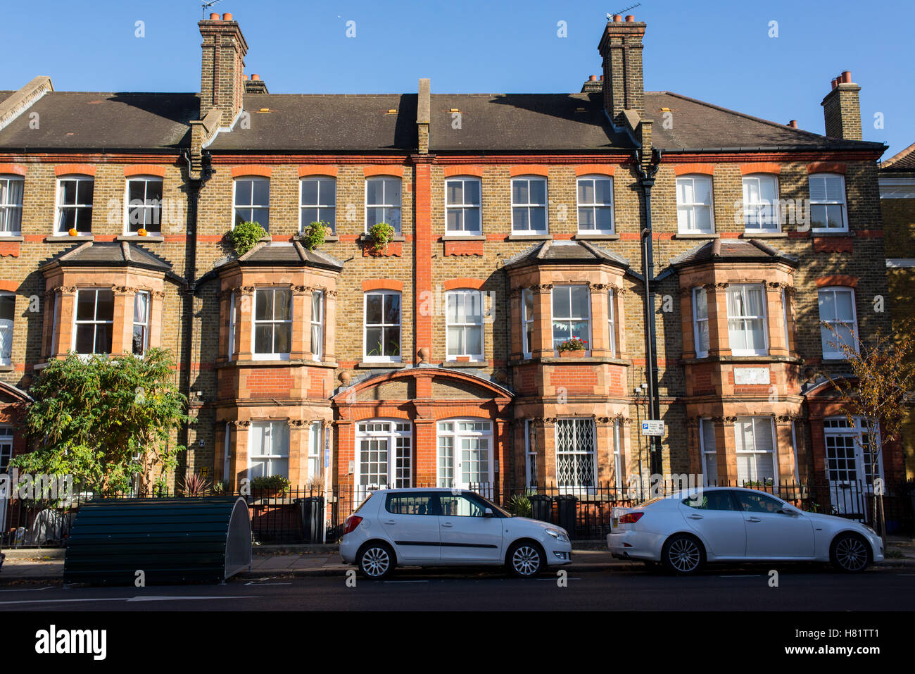 Front view of a classic English Victorian property with three floors of
