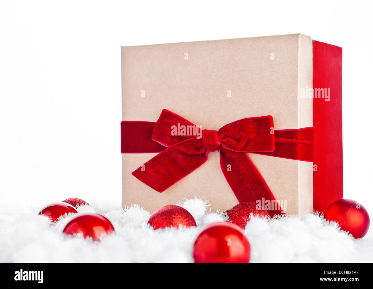 Red gift box for christmas with toys and snow on white background Stock ...