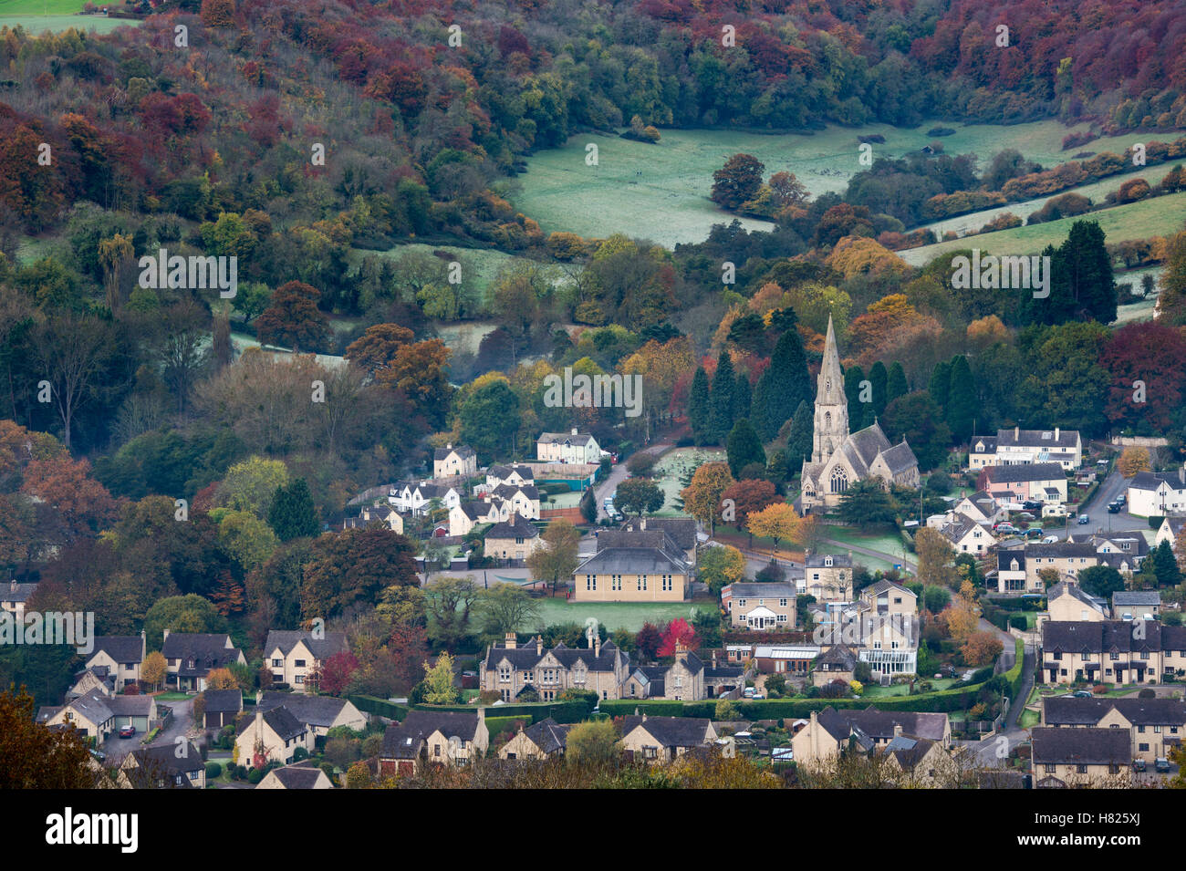 Woodchester in the Nailsworth Valley on a cold misty frosty autumn morning at dawn. Cotswolds, Gloucestershire, UK Stock Photo