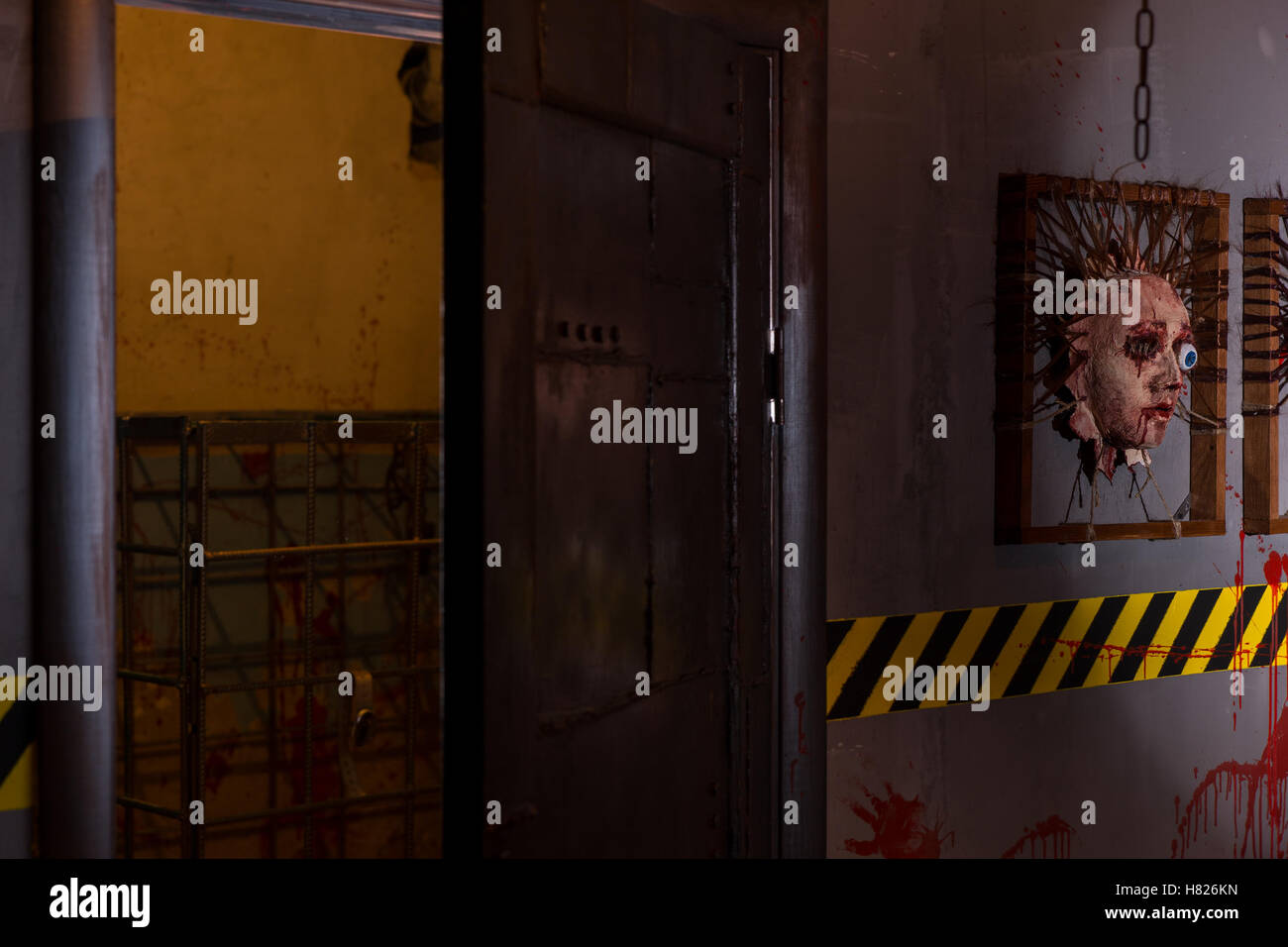 Frightful Open Door Near Ghastly Faces Stuck In Square Frames