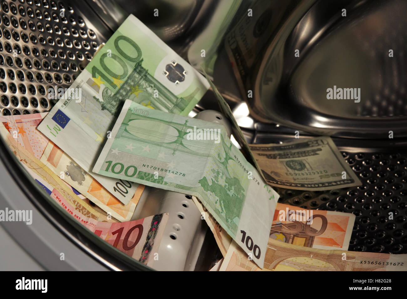 Money in the washing machine. Washing money Stock Photo Alamy