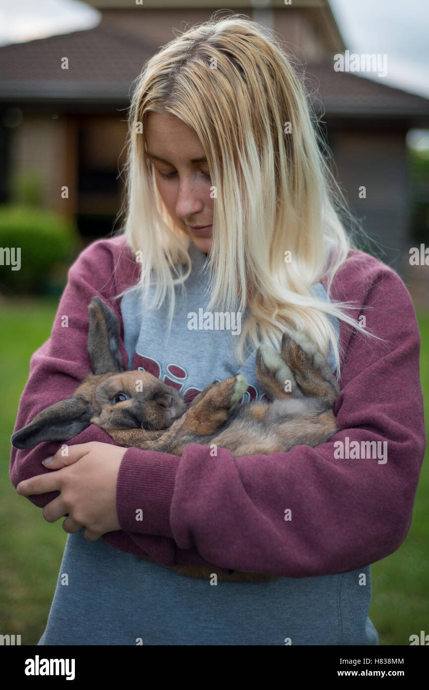 BALLARAT, VICTORIA, AUSTRALIA -  November 2, 2016: Shadae Shaw holding her pet rabbit Willow. (Photo by Dylan Burns). Stock Photo