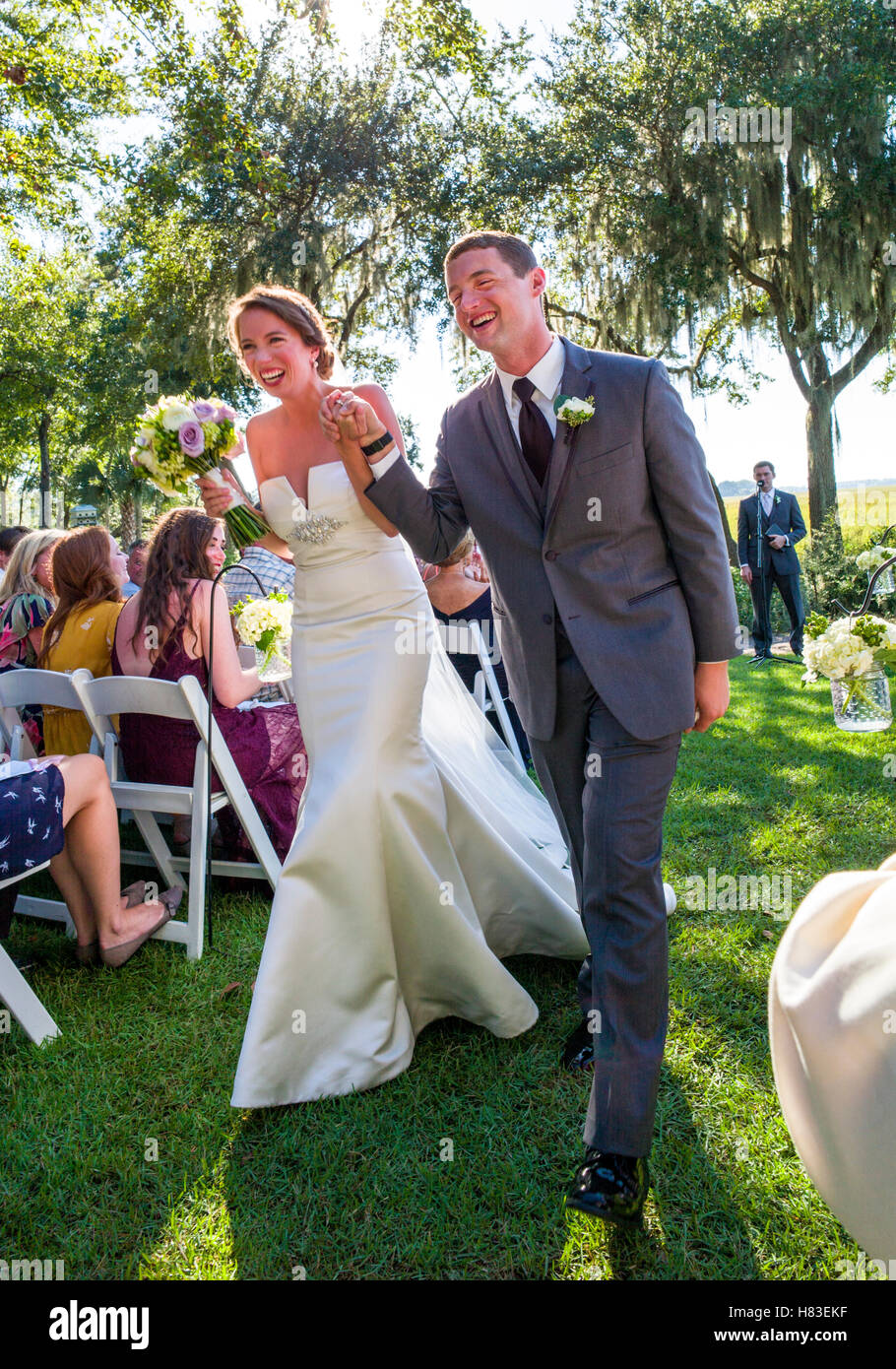 Outdoor garden wedding ceremony; Creek Club at I'On; Mt. Pleasant; near Charleston; South Carolina; USA Stock Photo