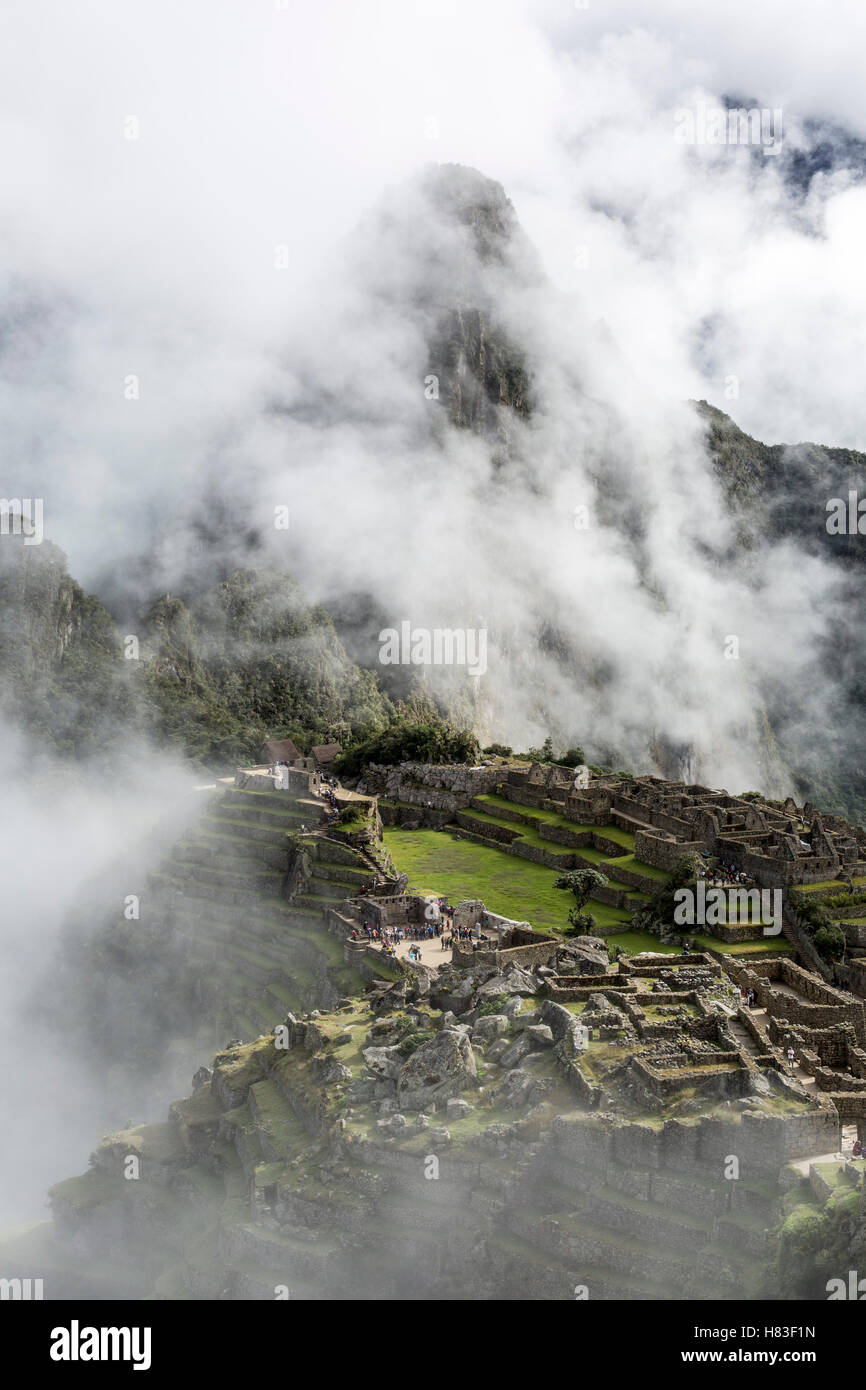 Machu Picchu in the clouds Stock Photo - Alamy