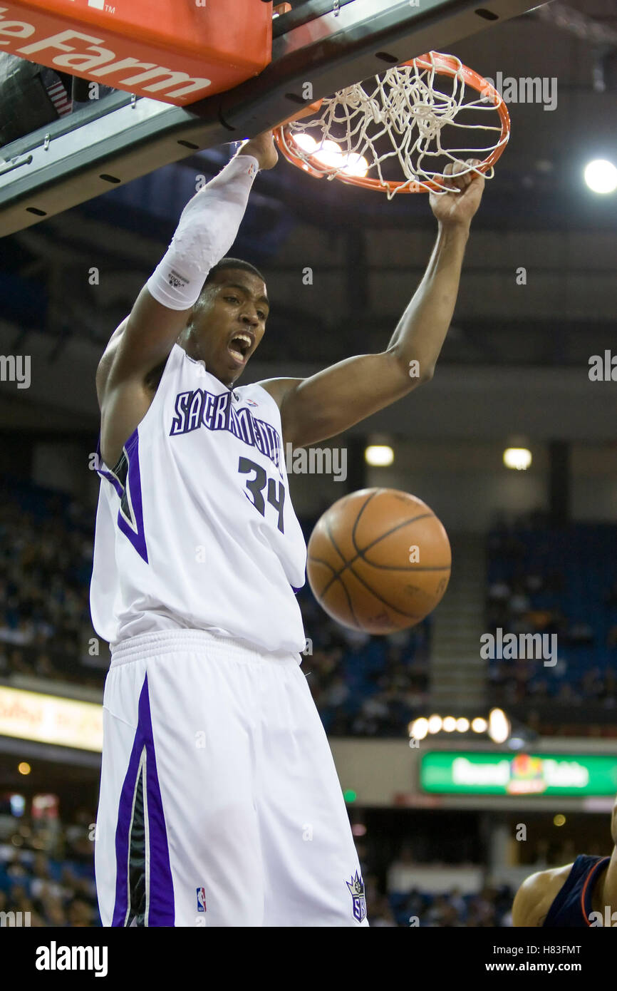 November 8, 2009; Sacramento, CA, USA;  Sacramento Kings forward Jason Thompson (34) dunks against the Golden State Warriors during the fourth quarter at the ARCO Arena. The Kings defeated the Warriors 120-107. Stock Photo