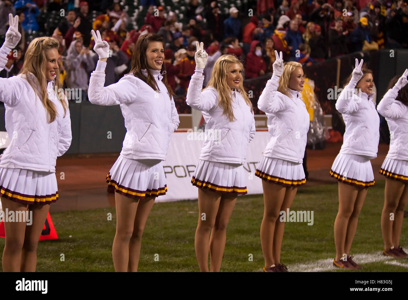 Dec 26, 2009; San Francisco, CA, USA;  Southern California Trojans cheerleaders celebrate after the game against the Boston College Eagles  in the 2009 Emerald Bowl at AT&T Park.  USC defeated BC 24-13. Stock Photo