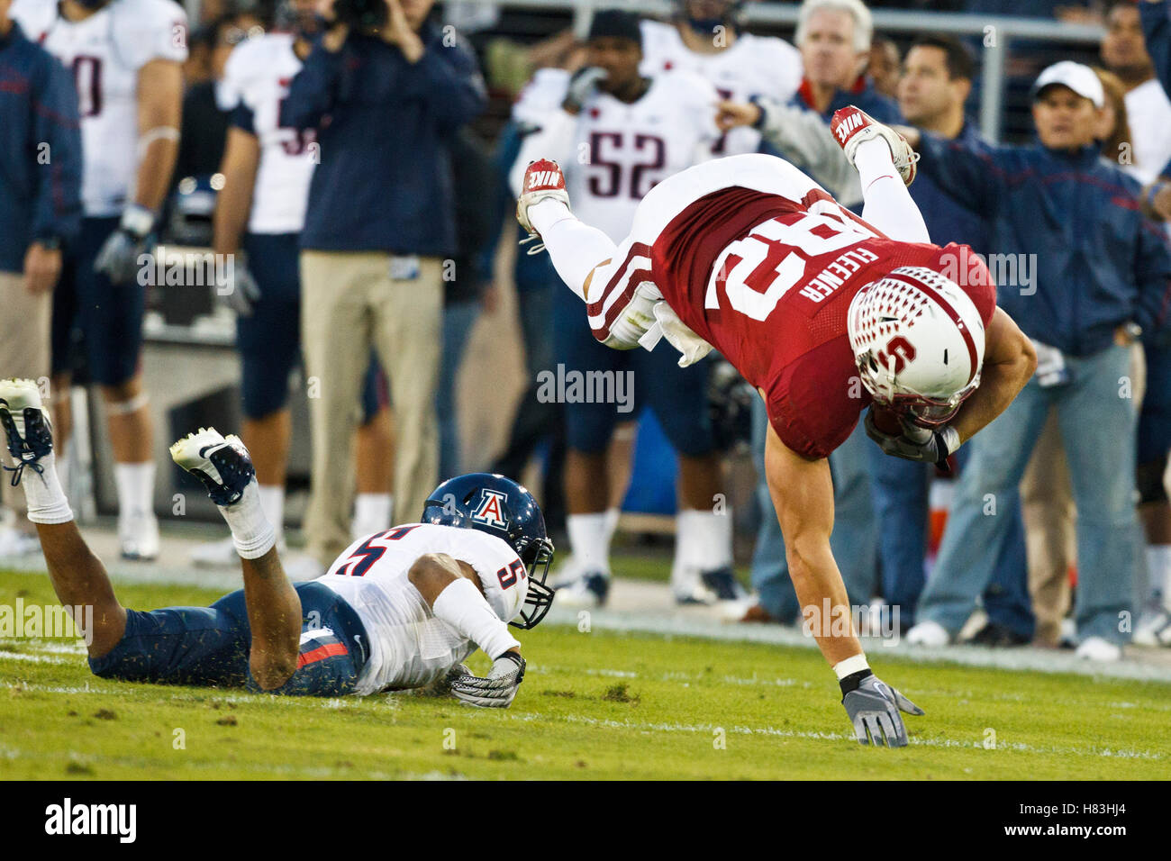 November 6, 2010; Stanford, CA, USA;  Stanford Cardinal tight end Coby Fleener (82) is tackled by Arizona Wildcats cornerback Shaquille Richardson (5) during the second quarter at Stanford Stadium. Stock Photo
