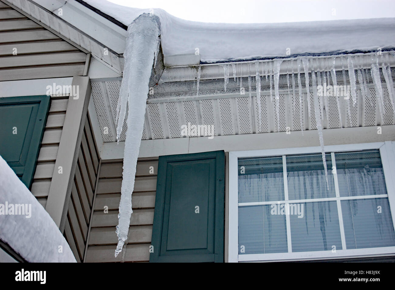 icicles hanging from the roof Stock Photo