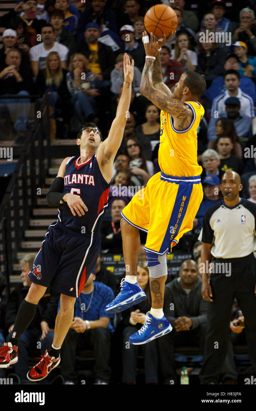 February 25, 2011; Oakland, CA, USA; Golden State Warriors shooting guard Monta Ellis (8) shoots