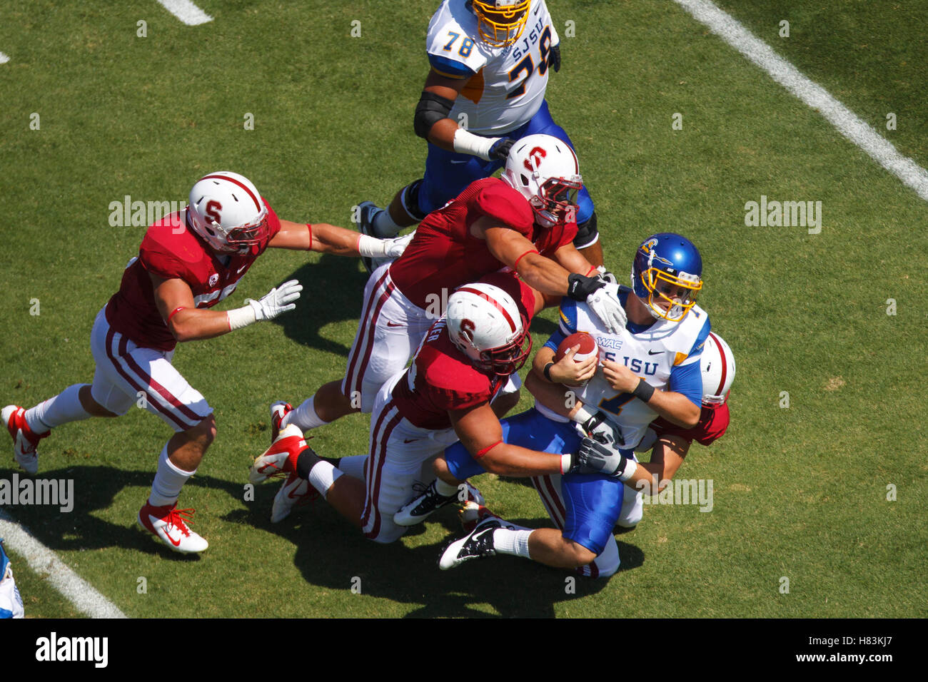 September 3, 2011; Stanford, CA, USA;  San Jose State Spartans quarterback Matt Faulkner (7) is sacked by Stanford Cardinal defensive end Ben Gardner (left, bottom) during the first quarter at Stanford Stadium. Stock Photo