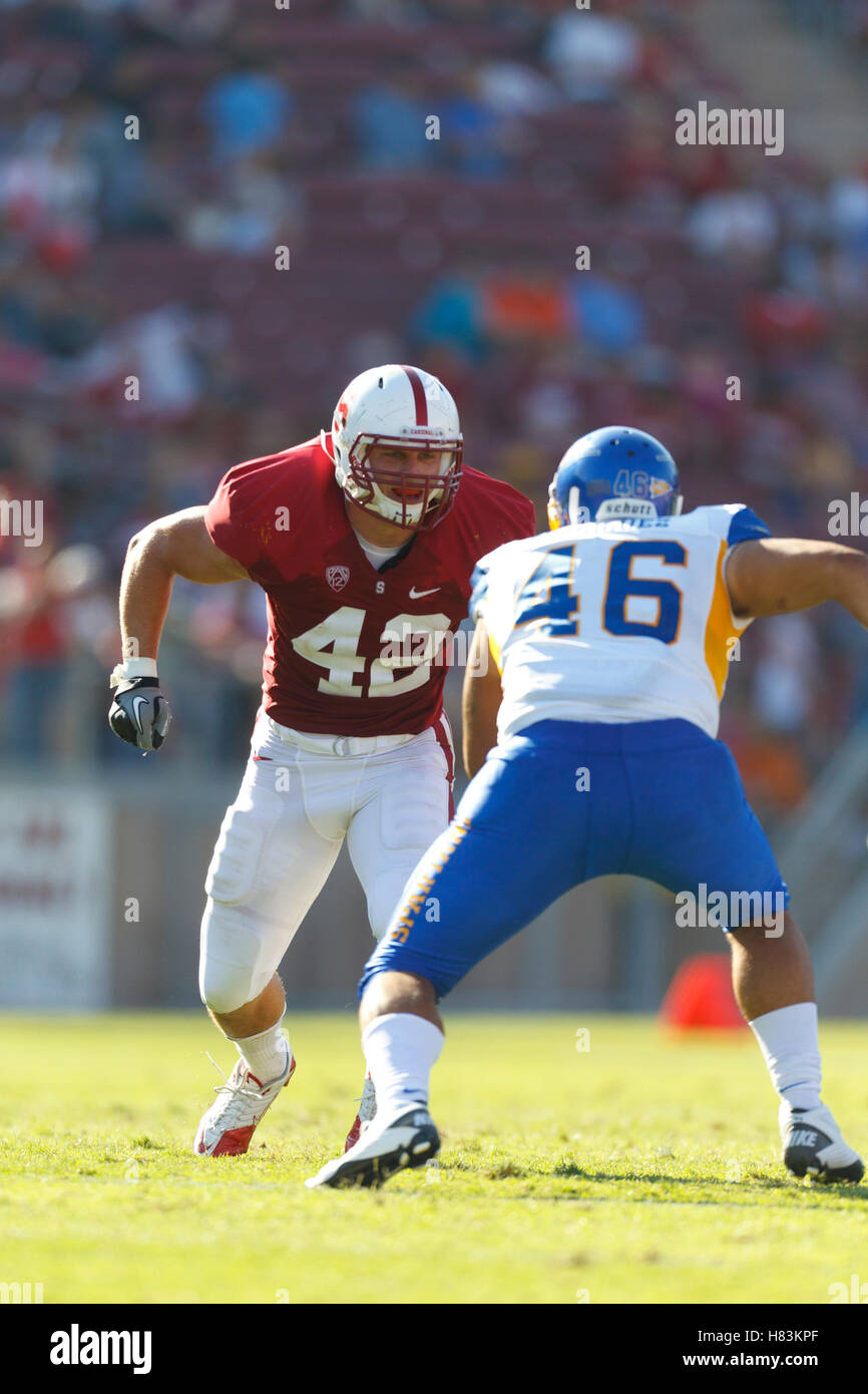 September 3, 2011; Stanford, CA, USA;  Stanford Cardinal linebacker Alex Debniak (42) lines up opposite San Jose State Spartans running back Ray Rodriguez (46) before a play during the fourth quarter at Stanford Stadium.  Stanford defeated San Jose State Stock Photo