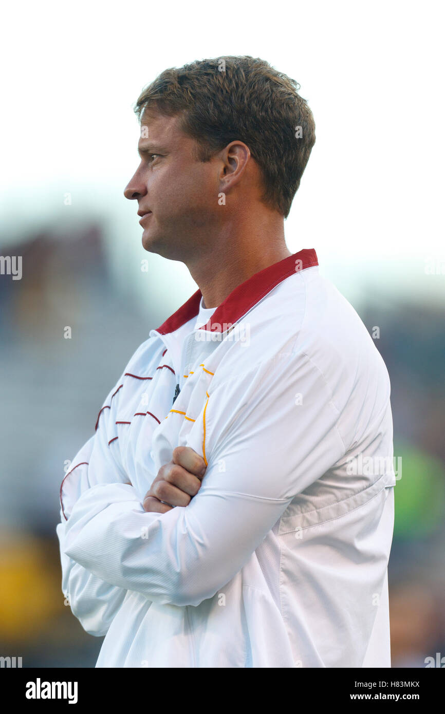 Oct 13, 2011; San Francisco CA, USA;  Southern California Trojans head coach Lane Kiffin watches his team before the game against the California Golden Bears at AT&T Park.  Southern California defeated California 30-9. Stock Photo