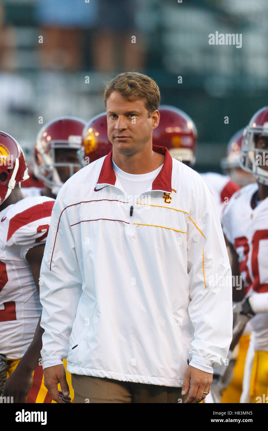 Oct 13, 2011; San Francisco CA, USA;  Southern California Trojans head coach Lane Kiffin watches his team warm up before the game against the California Golden Bears at AT&T Park.  Southern California defeated California 30-9. Stock Photo