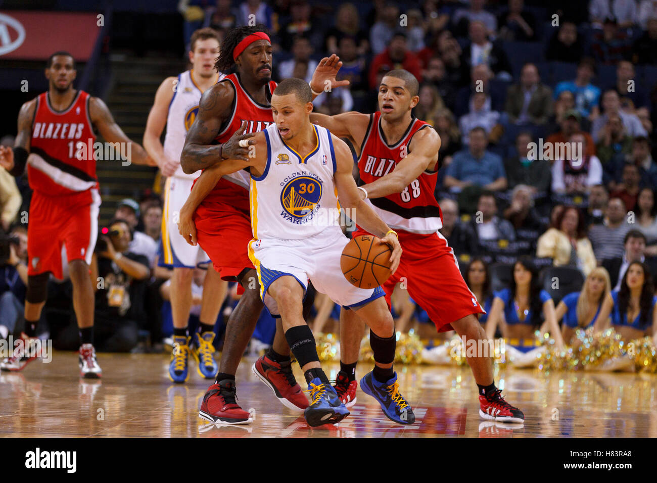 Jan 25, 2012; Oakland, CA, USA; Golden State Warriors point guard Stephen  Curry (30) dribbles the