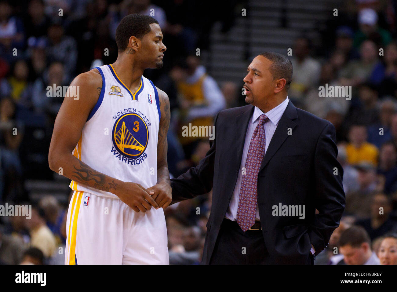 Feb 2, 2012; Oakland, CA, USA; Golden State Warriors head coach Mark Jackson  talks to forward Jeremy Tyler (3) during the second quarter against the  Utah Jazz at Oracle Arena Stock Photo - Alamy