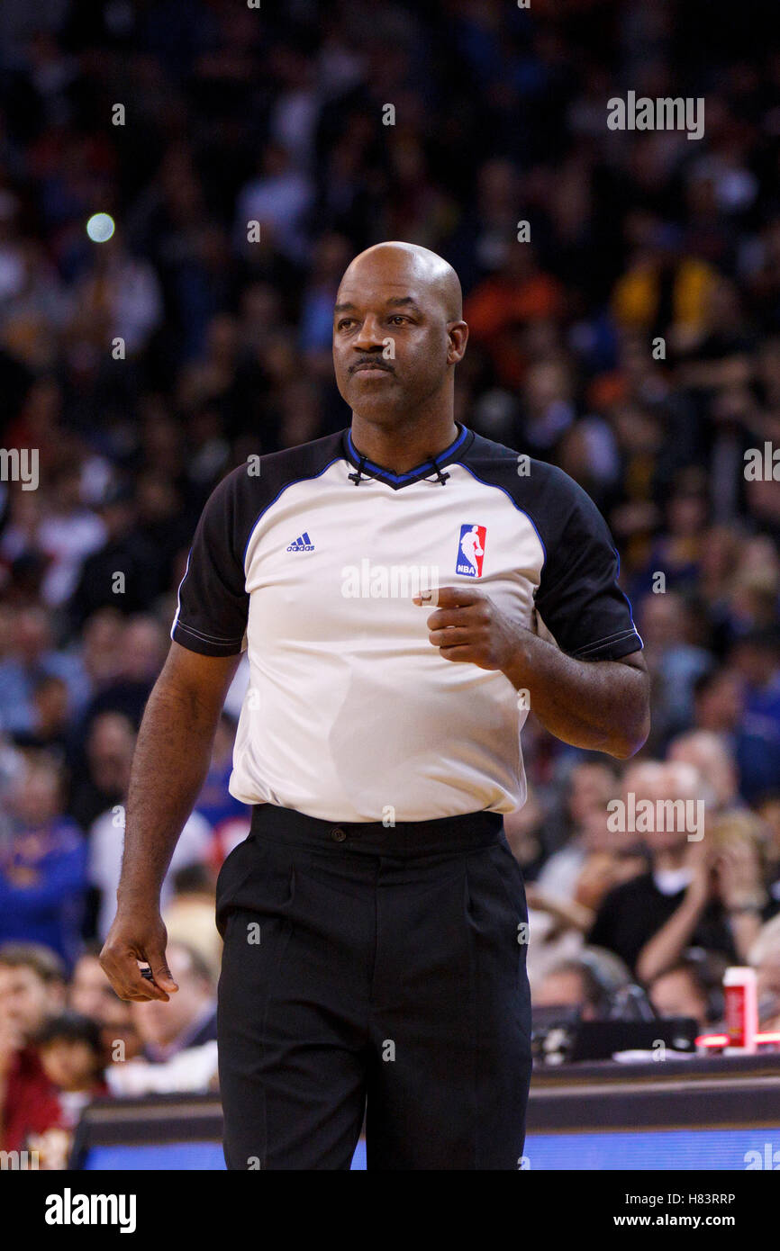 Feb 15, 2012; Oakland, CA, USA; NBA referee Haywoode Workman (66) during the fourth quarter between the Golden State Warriors and the Portland Trail Blazers at Oracle Arena. Portland defeated Golden State 93-91. Stock Photo