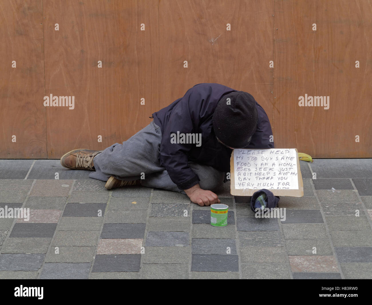 Homeless man begging on the street, Glasgow, Scotland, UK. Stock Photo
