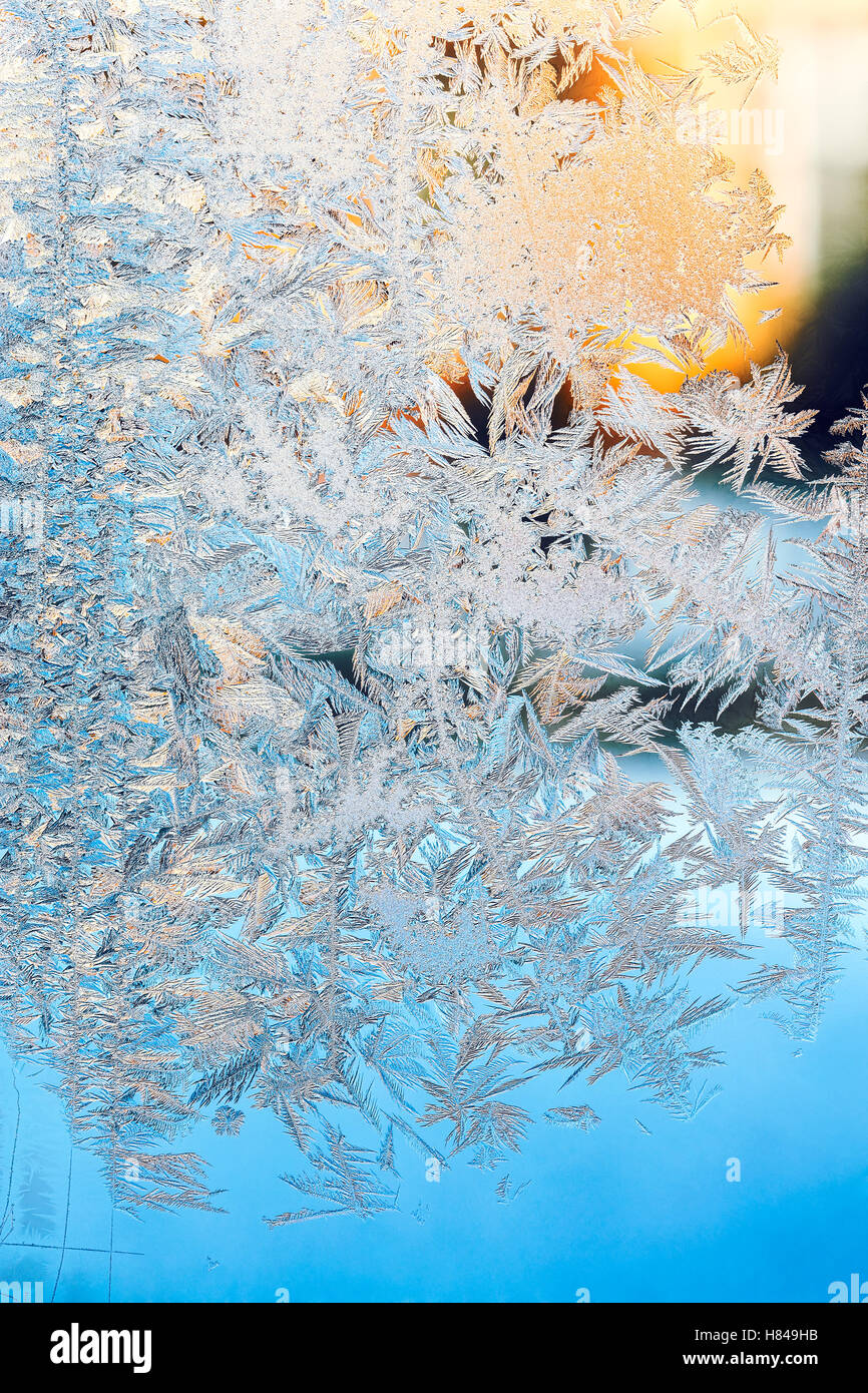 frosty pattern with sunlight on frozen window glass Stock Photo - Alamy