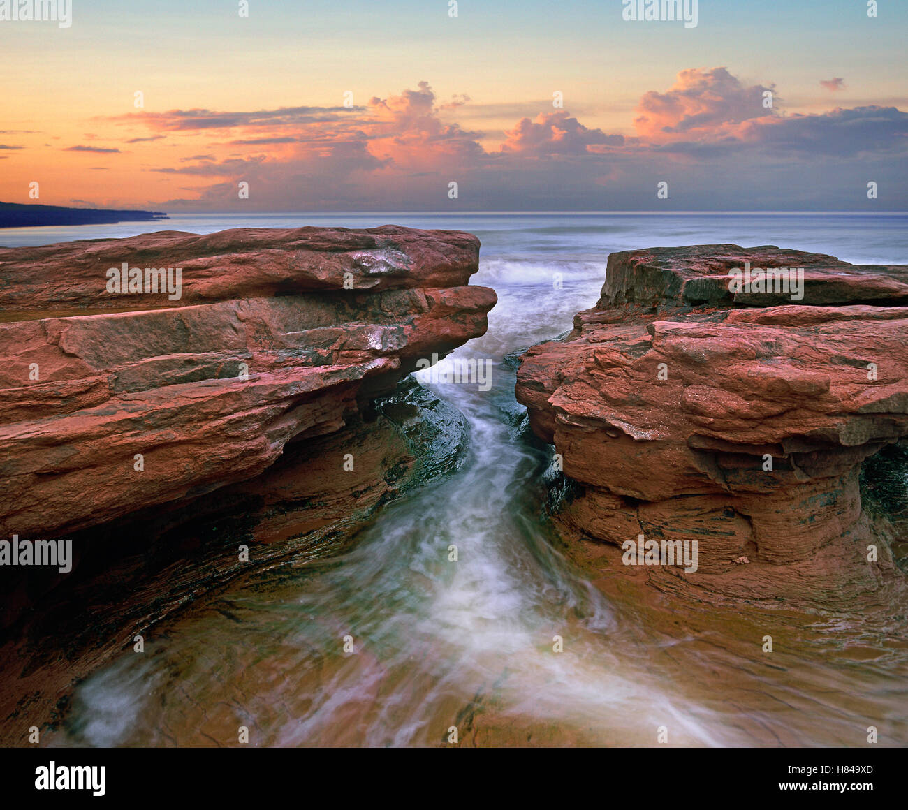 Water Rushing Through Rocks Water rushing through coastal rocks, Gulf of Saint Lawrence, Prince ...
