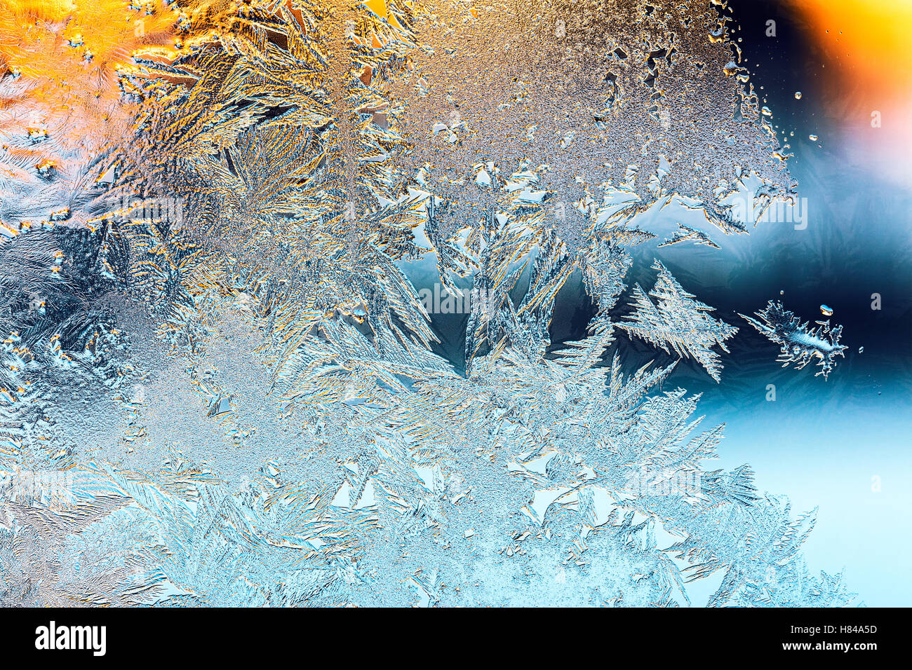 frosty pattern with sunlight on frozen window glass Stock Photo - Alamy