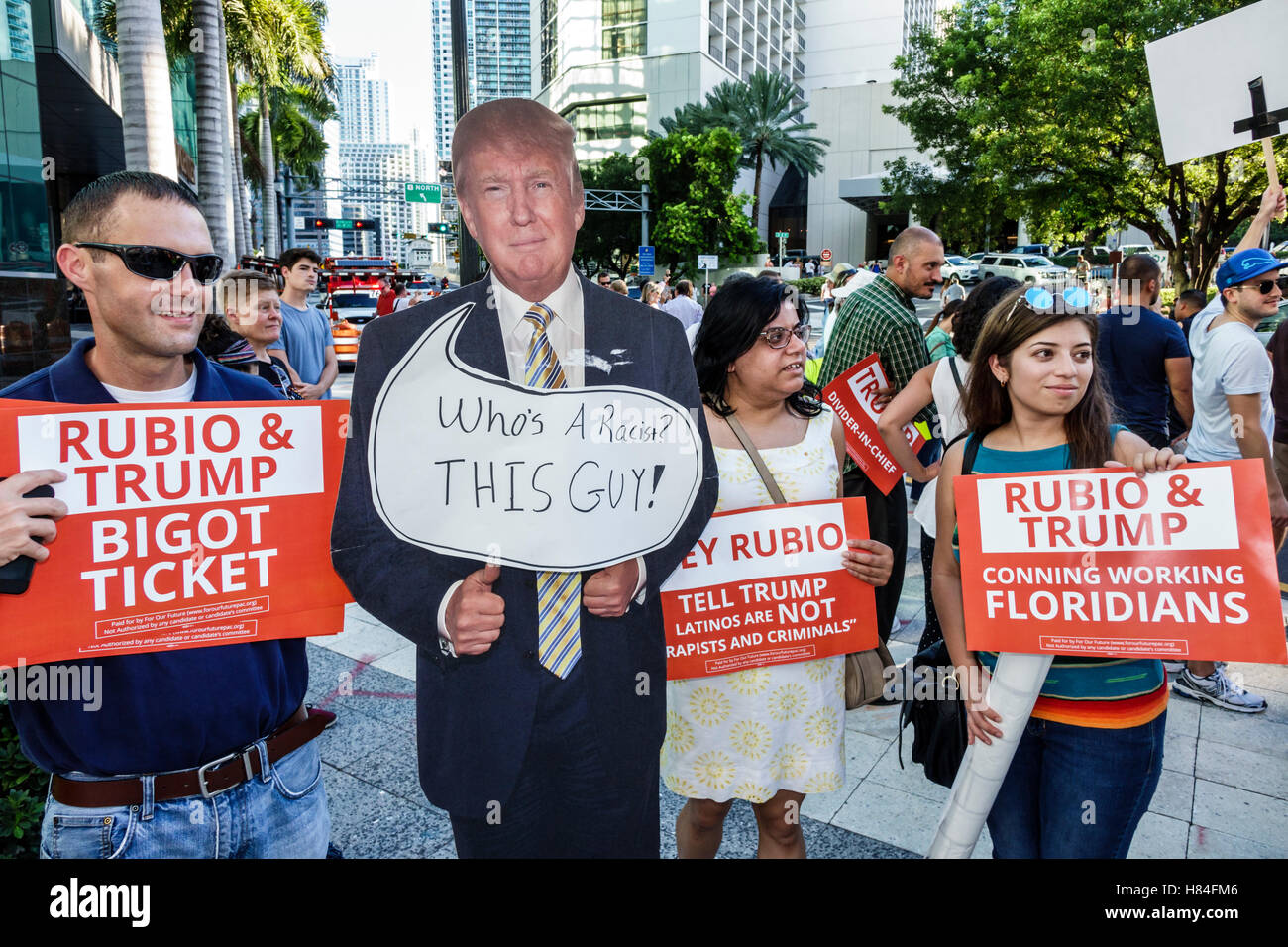Miami Florida,protesters,signs,protest,2016 presidential campaign,Rubio Trump,MoveOn.org,immigration,NeverTrump,Hispanic woman female women,holding,FL Stock Photo