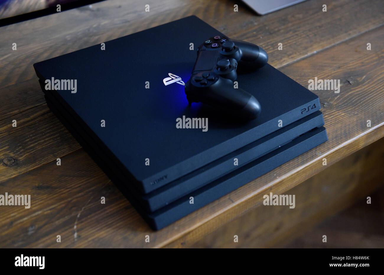 Berlin, Germany. 08th Nov, 2016. A Sony Playstation 4 Pro gaming consol and  controller seen during a PS4 Pro premiere event in Berlin, Germany, 08  November 2016. The teams from Sony Interactive