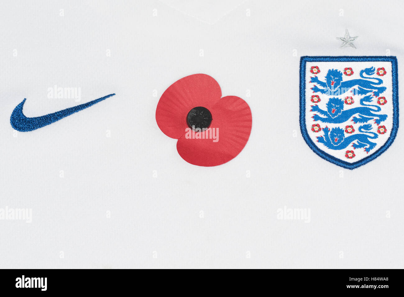 FIFA has banned players from England and Scotland from wearing poppies on their kits during their clash on November 11. The FA and SFA have said players will wear poppies on black armbands during their Armistice Day World Cup qualifier at Wembley. Stock Photo